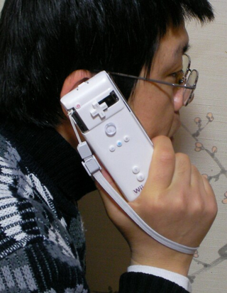 Illustration for article titled Is the WiiPhone Sexier Than the iiPhone? You the Jury Decide